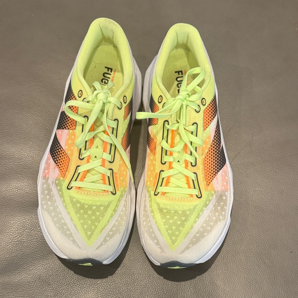 New Balance Rebel V4running shoes white, green, orange size 9.5 women’s